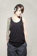 Photo: Girl with tattoos listening to music Girl with tattoos listening to music