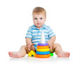 baby boy playing with colorful toy isolated on white