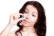 woman taking pills