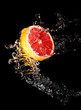 The stream of water and grapefruit