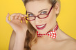 Beautiful blonde in a glasses and a bowtie