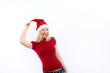 pretty blonde woman wearing a christmas hat having fun