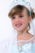 little girl dressed as bride