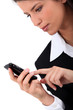 Woman typing on her mobile