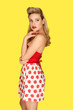 Retro fashion model in red polka dots