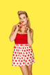 Retro fashion model in red polka dots
