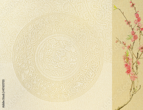 Photo: plum blossom on old antique vintage paper background plum blossom on old antique vintage paper background