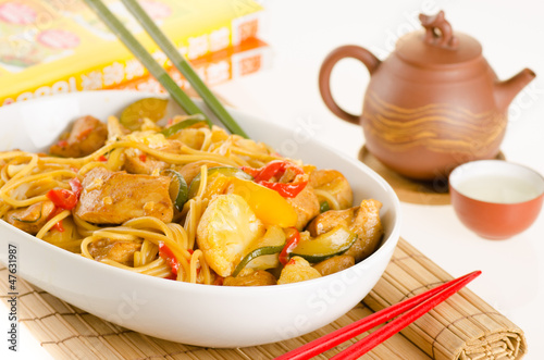 Photo: Stir-fried noodles with chicken and vegetables served in a bowl, Stir-fried noodles with chicken and vegetables served in a bowl,