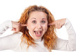girl closes her ears by hands