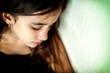 Emotional portrait of a sad girl with space for text