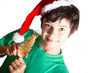 Foto: bambino con cappello di babbo natale bambino con cappello di babbo natale