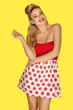 Retro fashion model in red polka dots