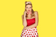 Retro fashion model in red polka dots