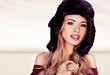 Foto: Beautiful blonde in a winter fur hat Beautiful blonde in a winter fur hat