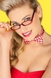 Beautiful blonde in a glasses and a bowtie