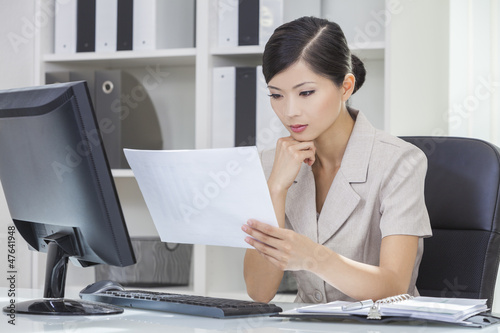 Photo: Asian Chinese Woman or Businesswoman in Office Asian Chinese Woman or Businesswoman in Office