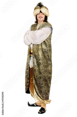 Photo: Young man in oriental costume Young man in oriental costume