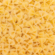 Italian Farfalle Pasta raw food background or texture