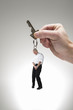 Concept picture of studio man as key chain