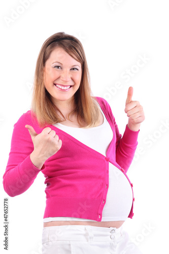 Photo: Happy pregnant woman thumbs up isolated on white background. Happy pregnant woman thumbs up isolated on white background.