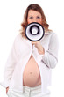 Pregnant woman in white speaks into megaphone isolated on white