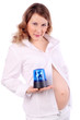 Pregnant woman in white holds blue flasher isolated on white