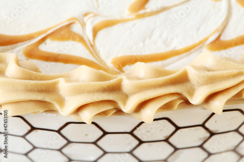 Photo: caramel and cream decorations at appetizing festive cake caramel and cream decorations at appetizing festive cake