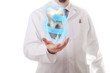 Photo: Male dentist showing a molar tooth Male dentist showing a molar tooth