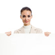 Businesswoman showing blank signboard, on white