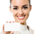 Businesswoman showing blank business card, isolated