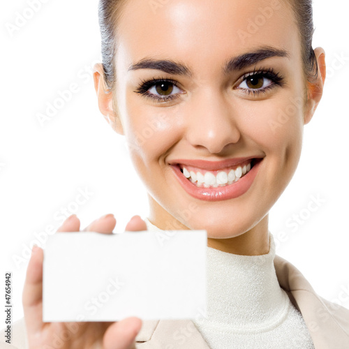 Photo: Businesswoman showing blank business card, isolated Businesswoman showing blank business card, isolated