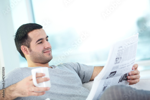 Photo: Reading newspaper Reading newspaper