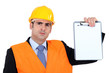 angry businessman holding a clip board