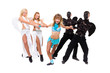 Actors dressed as angels and demons posing