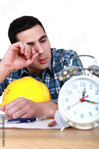 Photo: Architect woken-up by alarm Architect woken-up by alarm