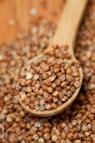 Photo: buckwheat in a wooden spoon buckwheat in a wooden spoon