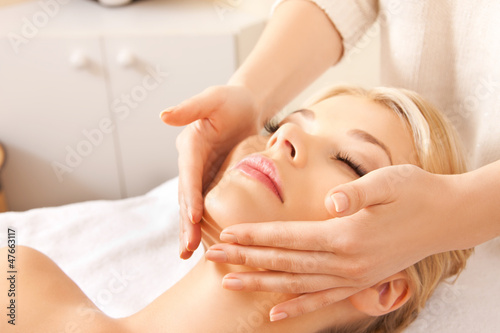 Photo: beautiful woman in massage salon beautiful woman in massage salon
