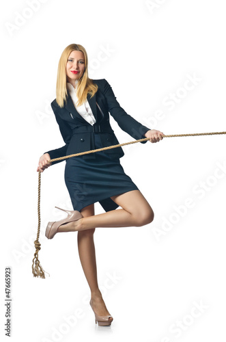 Photo: Businesswoman in tug of war concept Businesswoman in tug of war concept