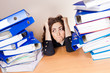 Woman with tons of folders