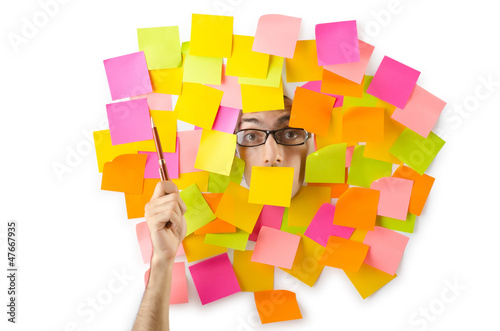 Photo: Man's face through paper and reminders Man's face through paper and reminders