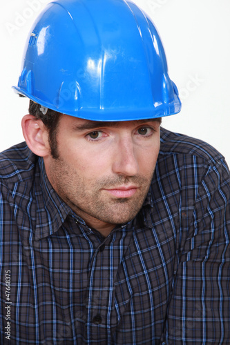 Photo: Portrait of tradesman lacking self-confidence Portrait of tradesman lacking self-confidence