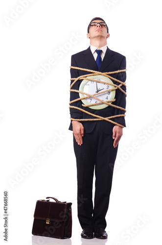 Photo: Businessman tied up with rope on white Businessman tied up with rope on white