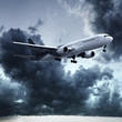 Jet is climbing just after take-off in dramatic stormy sky. Squa