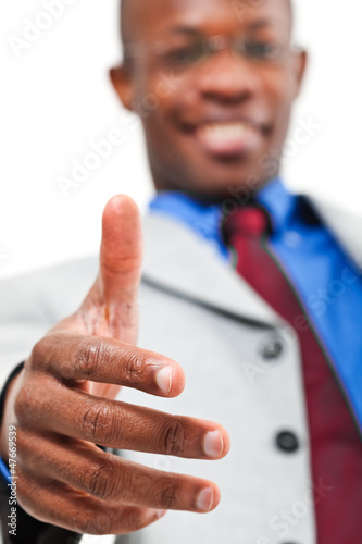 Photo: African businessman offering a handshake African businessman offering a handshake