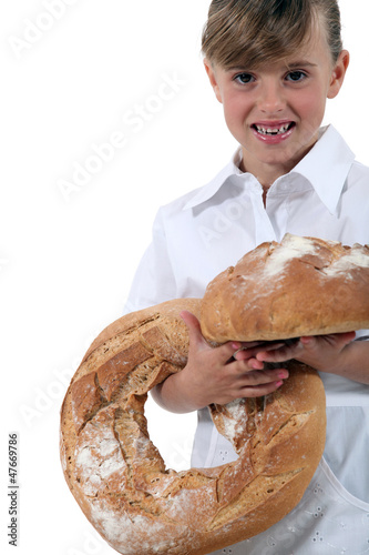 Photo: Little girl dressed as bakery worker Little girl dressed as bakery worker