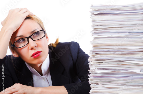 Photo: Woman businesswoman with lots of papers Woman businesswoman with lots of papers