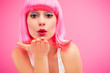 Young female blowing kiss