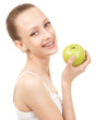 Cute girl in braces with green apple on white background