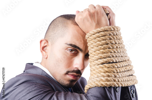 Photo: Businessman tied up with rope Businessman tied up with rope