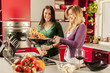 Young women in the kitchen